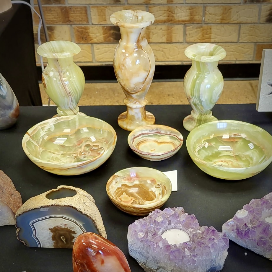 vases and bowls made from stone as well as candle holders made form minerals